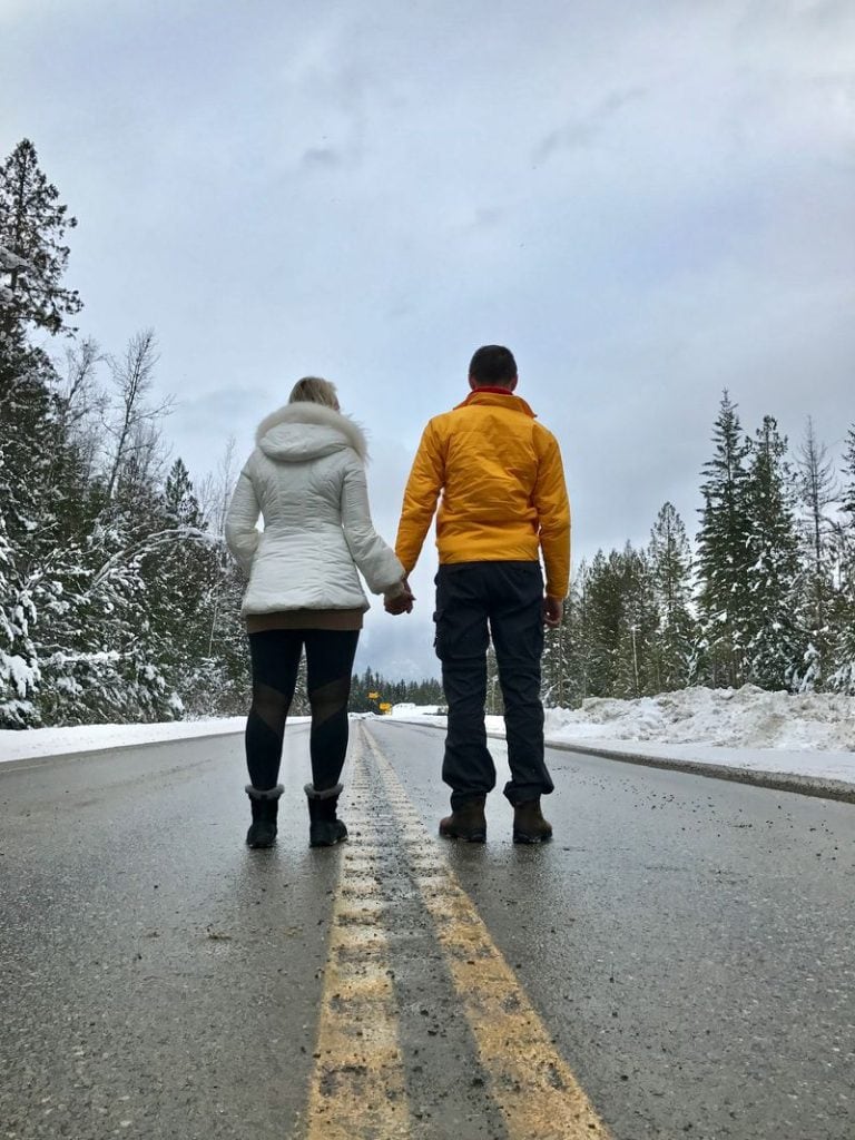 Holding Hands on the highway on a British Columbia Road trip near Nakusp