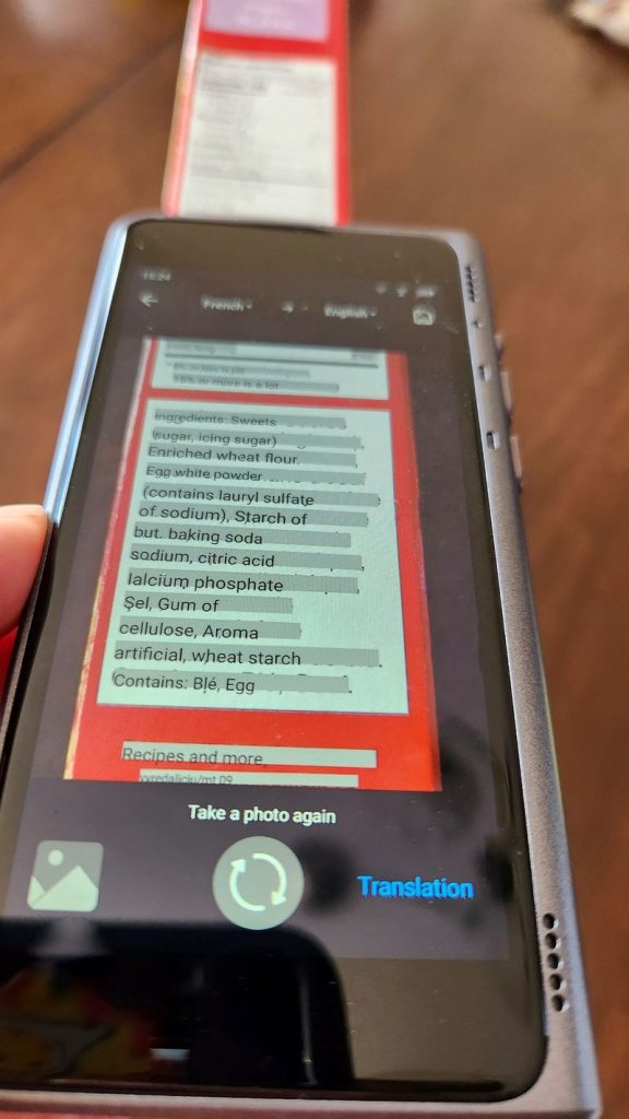 Fluentalk T1 showing English text photo translation from French original