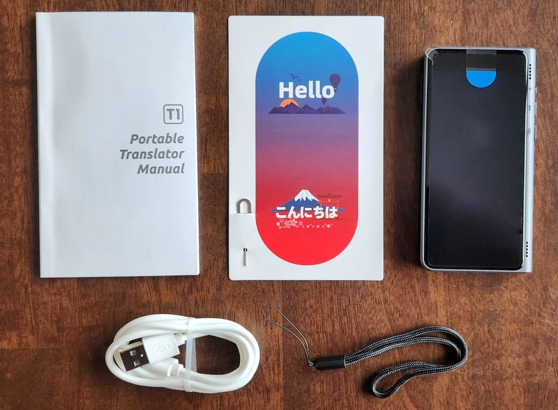 Fluentalk Unboxing with manual lanyard USB cable and SIM card eject tool