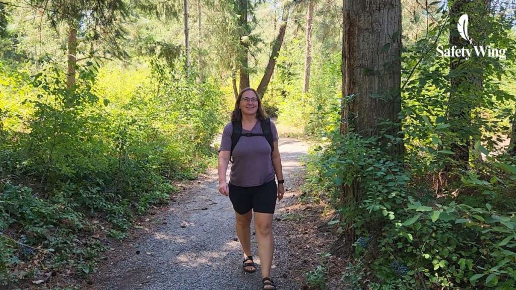Safety Wing Micki walking in the woods 