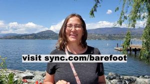 Sync Review with text for sync discount Micki in front of Okanagan Lake Kelowna BC