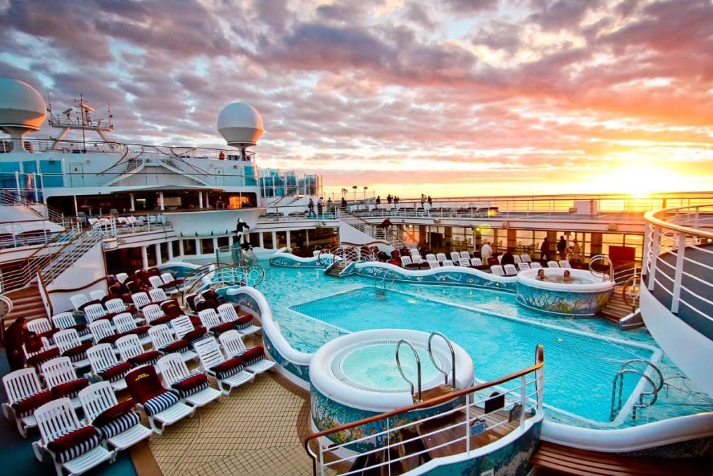 A pool and deck on a cruise ship