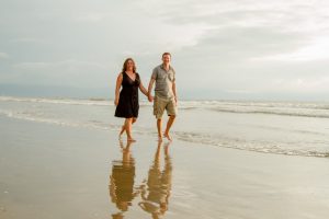 The Barefoot Nomad Micki and Charles on the beach in Mexico