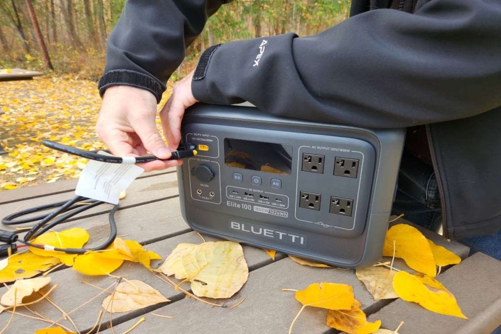Bluetti Elite 100 V2 plugging solar panel into front