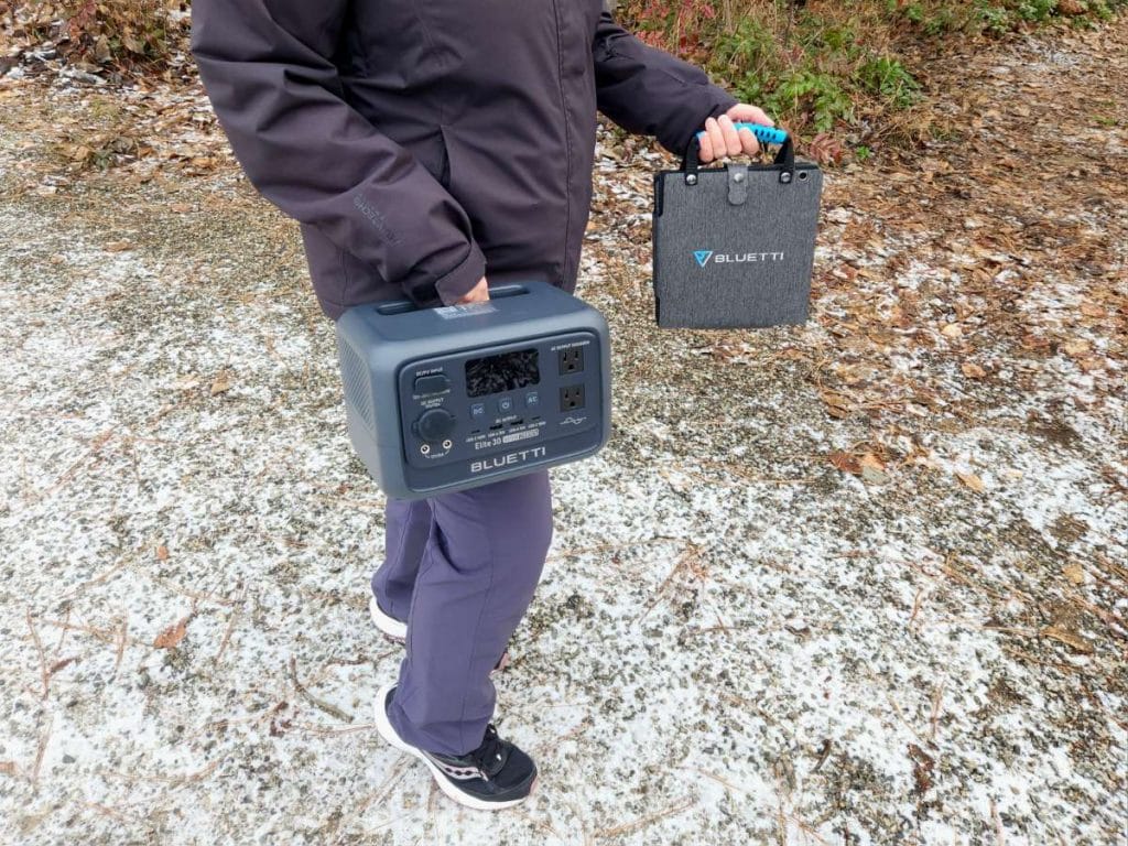 Bluetti Elite 30 V2 and BLUETTI SORA 60 Solar Panel in hand