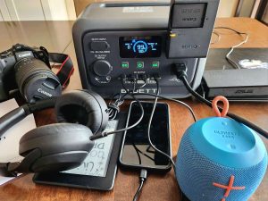 with DSLR and charging phone speaker kindle earbuds camera battery and laptop Bluetti Elite 30 V2