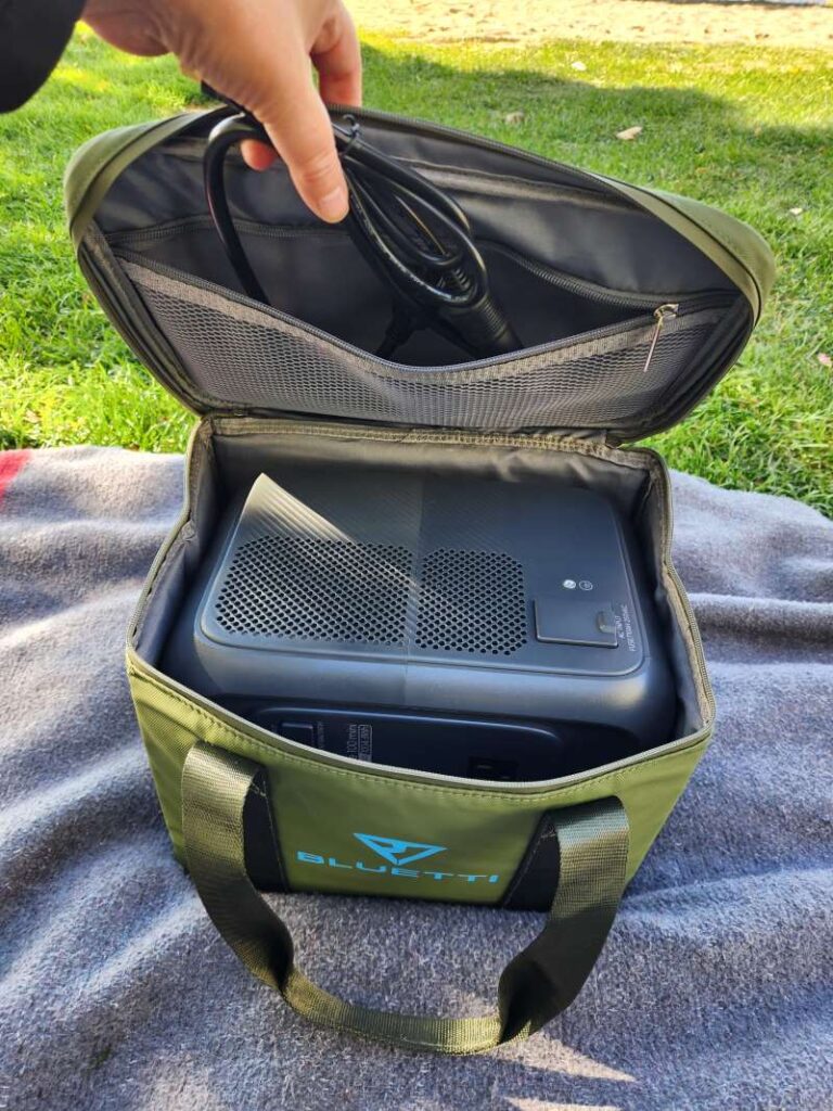 BLUETTI Elite 100 Mini in carrying case at park